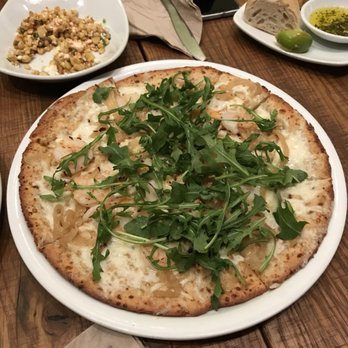California Pizza Kitchen - Shrimp Scampi Pizza w/ Cauliflower Crust - Pizza Near Me - Tysons, Virginia California Pizza Kitchen - Shrimp Scampi Pizza w/ Cauliflower Crust - Pizza Near Me - Tysons, Virginia