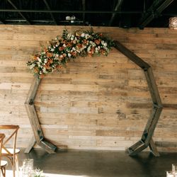 Wonderland Floral Art and Gift Loft - The floral arrangement on our arbor