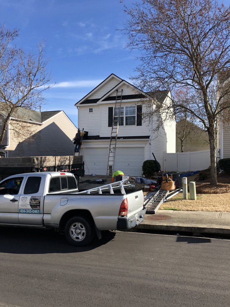 Slide of MTZ Roofing