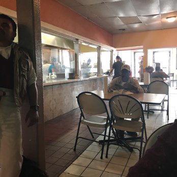 El Cesar - a man walking through a restaurant - Mexican Near Me - Orosi, California