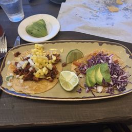 Grilled Shrimp Taco- Marinated shrimp, red cabbage, avocado, chipotle dressing, pico de gallo. Pork Al Pastor Taco- White onion, pineapple. Grilled Shrimp Taco- Marinated shrimp, red cabbage, avocado, chipotle dressing, pico de gallo. Pork Al Pastor Taco- White onion, pineapple.