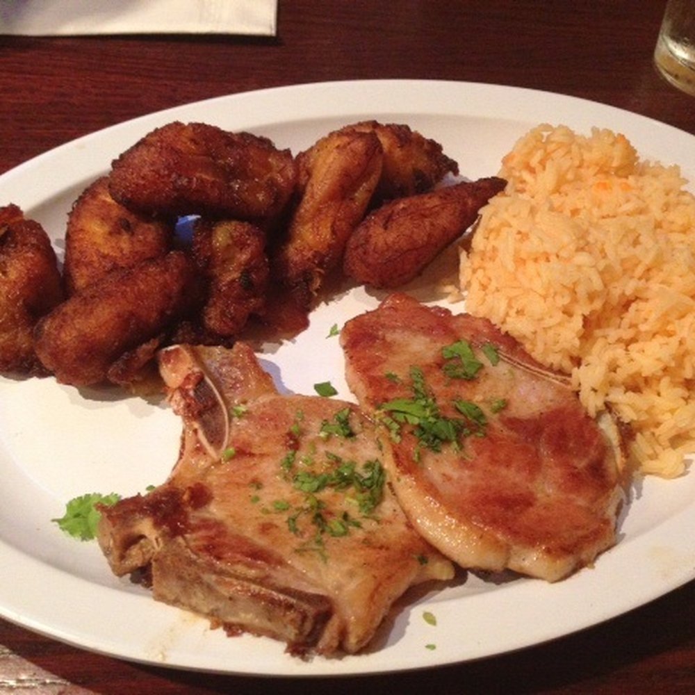 Pio Pio - Pork chops, yellow rice, sweet plantains. - Colombian Near Me - Charlotte, North Carolina Pio Pio - Pork chops, yellow rice, sweet plantains. - Colombian Near Me - Charlotte, North Carolina