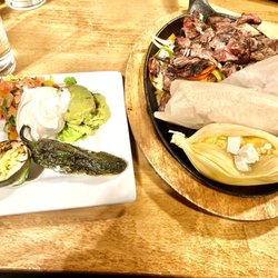 Steak fajitas and sweet corn tamal