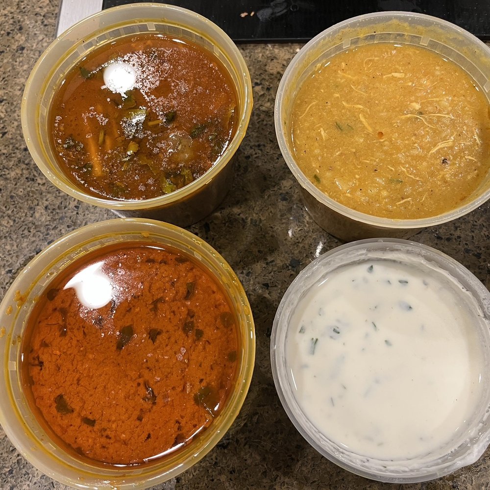 Clockwise from top left: Nihari, Haleem, Raita, Chicken Tikka Masala