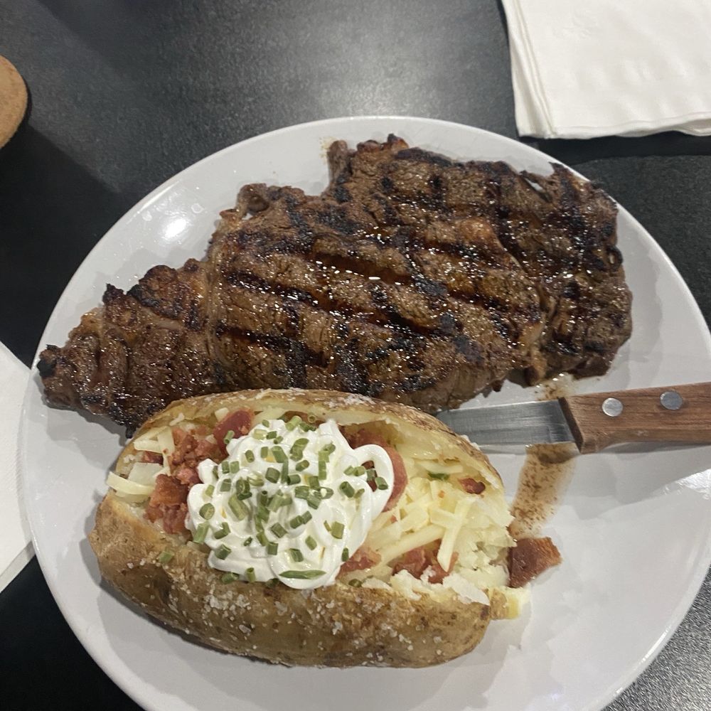 Oark Mountain View Bistro - Ribeye and baked potato - Desserts Near Me - Ozone, Arkansas Oark Mountain View Bistro - Ribeye and baked potato - Desserts Near Me - Ozone, Arkansas