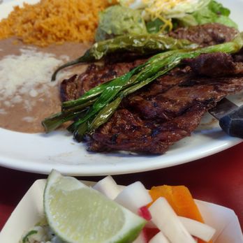 Taqueria El Sabor - A carne asada plate.. with beans and rice and guacamole.. - Tacos Near Me - Tacoma, Washington Taqueria El Sabor - A carne asada plate.. with beans and rice and guacamole.. - Tacos Near Me - Tacoma, Washington