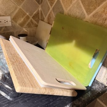 Atlas CleanWorks - dirty chopping boards next to "clean dishes" - Office Cleaning Near Me Atlas CleanWorks - dirty chopping boards next to "clean dishes" - Office Cleaning Near Me
