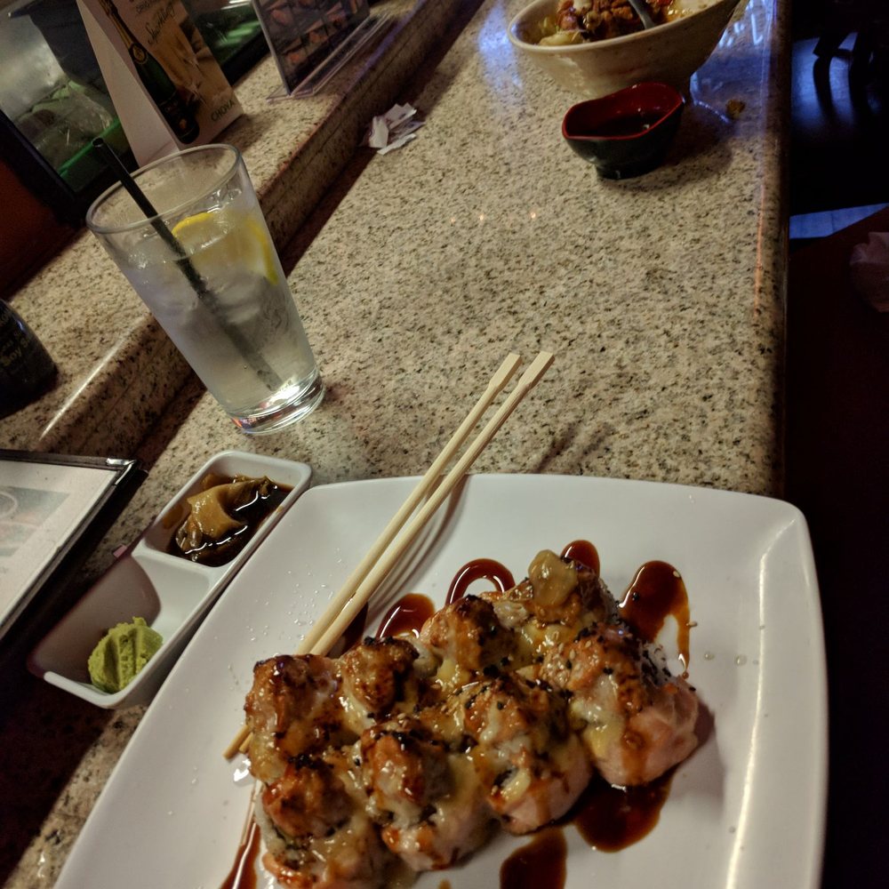 Sanyo Sushi - Volcano Roll. I always add a few squirt of lemon to my salmon topped sushi. One of the best baked salmon rolls I've had to date. - Sushi Bars Near Me - Glendora, California Sanyo Sushi - Volcano Roll. I always add a few squirt of lemon to my salmon topped sushi. One of the best baked salmon rolls I've had to date. - Sushi Bars Near Me - Glendora, California
