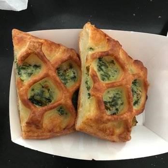 Gran Milan - Spinach cheese strudel cut in half - Pizza Near Me - Richmond, California Gran Milan - Spinach cheese strudel cut in half - Pizza Near Me - Richmond, California