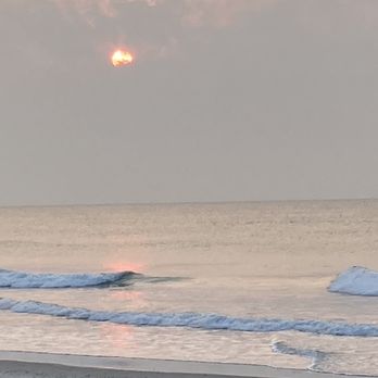 Wrightsville Beach - The sun finally broke through and reflected on the waves - Beaches Near Me - Wrightsville Beach, North Carolina