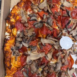 Me-n-Ed's Pizzeria - My Large where they sprinkled some sausage last minute