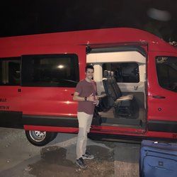 Johnny Cab - John with his beautiful new 14-passenger van!