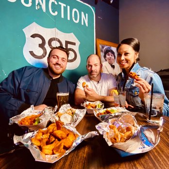 Slater's Ding-a-Wing - The Squad enjoying the wings and fries - Street Vendors Near Me Slater's Ding-a-Wing - The Squad enjoying the wings and fries - Street Vendors Near Me