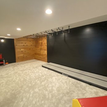 Trim It Up - Utility room turned into play room with monkey bars and rock climbing wall - Painters Near Me - Carmel, Indiana Trim It Up - Utility room turned into play room with monkey bars and rock climbing wall - Painters Near Me - Carmel, Indiana