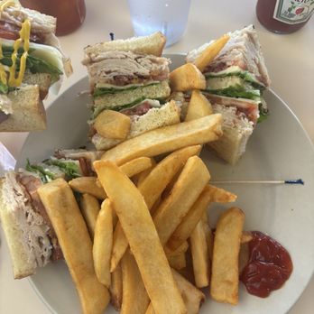 Katrina's Cafe - Club sandwich, could've been split between two. Fries are nice and crispy. - Breakfast & Brunch Near Me - Auburn, California