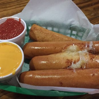 Connor's Pub - Bosco sticks stuffed with cheese, served with more cheese and marinara! - Pubs Near Me - Indianapolis, Indiana