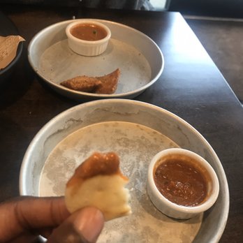 Curry Up Now - Naan bites status: almost done + close-up of the genius - Indian Near Me - Decatur, Georgia