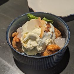 Coconut Ice Cream with puff pastry filled with cream and corn