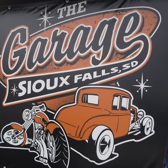 The Garage Bar - an orange truck and a beer - Pubs Near Me - Sioux Falls, South Dakota The Garage Bar - an orange truck and a beer - Pubs Near Me - Sioux Falls, South Dakota