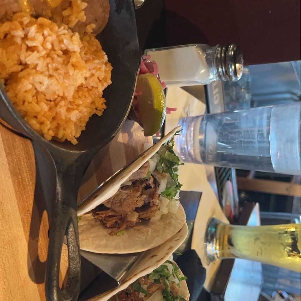Mezcaluna - Carnitas tacos served with beans, rice, and a delicious sauce (20) - Mexican Near Me - Happy Valley, Oregon Mezcaluna - Carnitas tacos served with beans, rice, and a delicious sauce (20) - Mexican Near Me - Happy Valley, Oregon