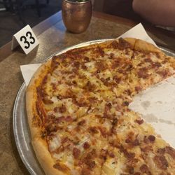 Justine's Pizza - Pineapple, bacon, onion