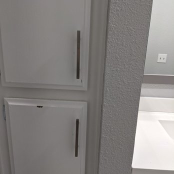 RLR Home Construction - Touch up paint not done for cabinet in one of our restrooms. - General Contractors Near Me - Corona, California