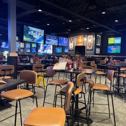 seating and televisions in a sports restaurant