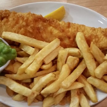 Laughing Halibut - Fish-n-chips done right! Served with mushy peas. - Fish & Chips Near Me - London, XGL Laughing Halibut - Fish-n-chips done right! Served with mushy peas. - Fish & Chips Near Me - London, XGL