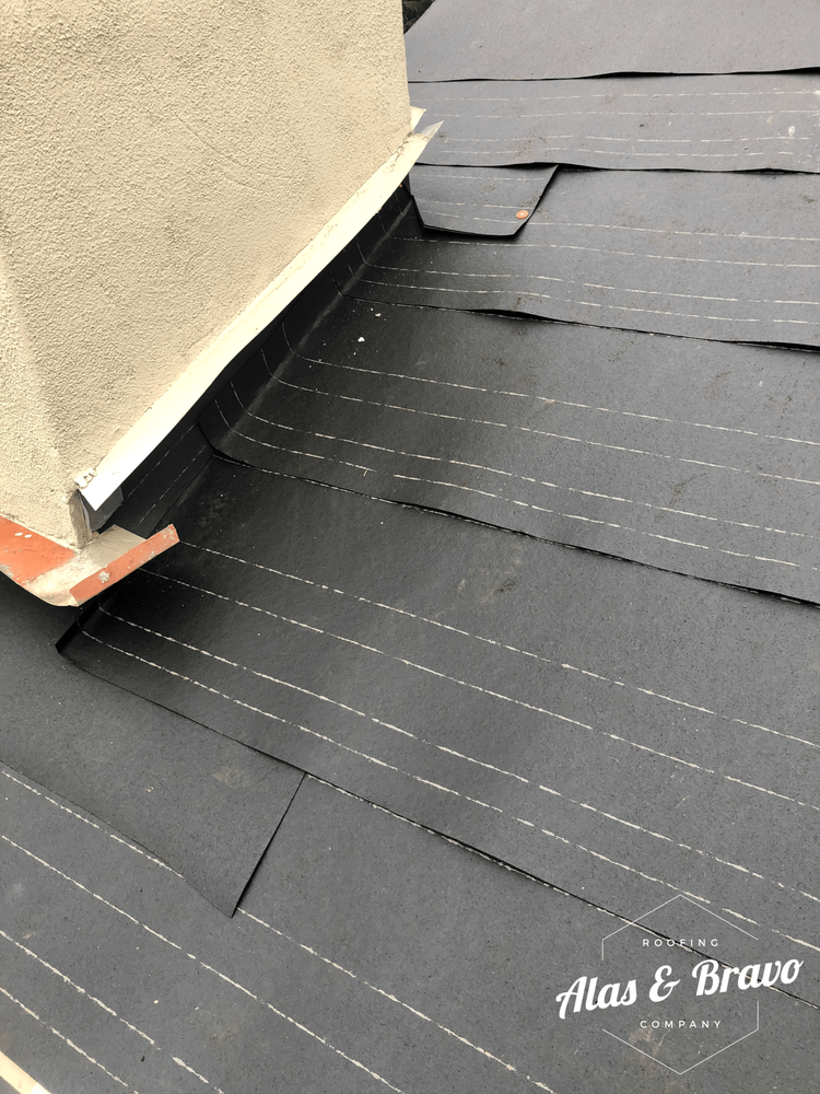 Slide of Alas & Bravo Roofing Company