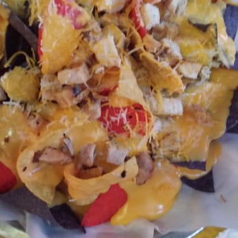 Coach's - Nachos, with sour cream, guacamole, salsa and jalapenos on the side. - Sports Bars Near Me - Lancaster, California Coach's - Nachos, with sour cream, guacamole, salsa and jalapenos on the side. - Sports Bars Near Me - Lancaster, California