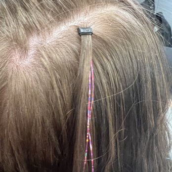 Alexis Holt Makeup - Tinsel bead and pink tinsel by the hair part - Makeup Artists Near Me