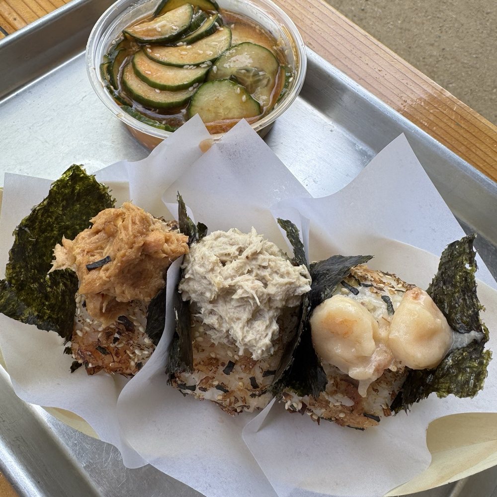 OniGuru - spicy tuna, spicy shrimp, and salmon Onigiri with a side of Japanese Cucumber Salad - Japanese Near Me - Garden Grove, California
