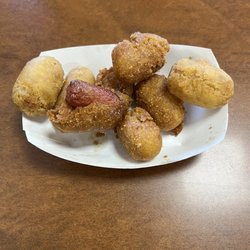 Mini corn dogs half were double dipped and others had a distinct color difference like they were fried the one time.