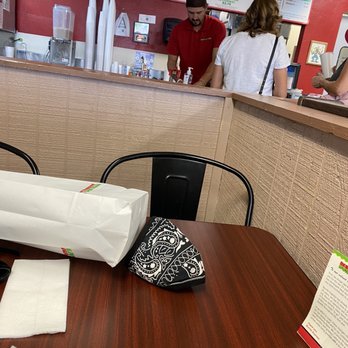 Burrito Express - a burrito sitting on a table in a fast food restaurant - Mexican Near Me - Gilbert, Arizona