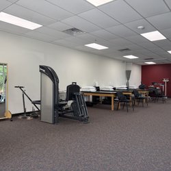 Carolina Physical Therapy and Sports Medicine - Interior view of Rock Hill physical therapy clinic with advanced equipment for TMJ, vestibular, and dry needling treatments.