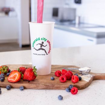 Emerald City Smoothie - strawberries and blueberries on a cutting board - Juice Bars & Smoothies Near Me - Federal Way, Washington Emerald City Smoothie - strawberries and blueberries on a cutting board - Juice Bars & Smoothies Near Me - Federal Way, Washington