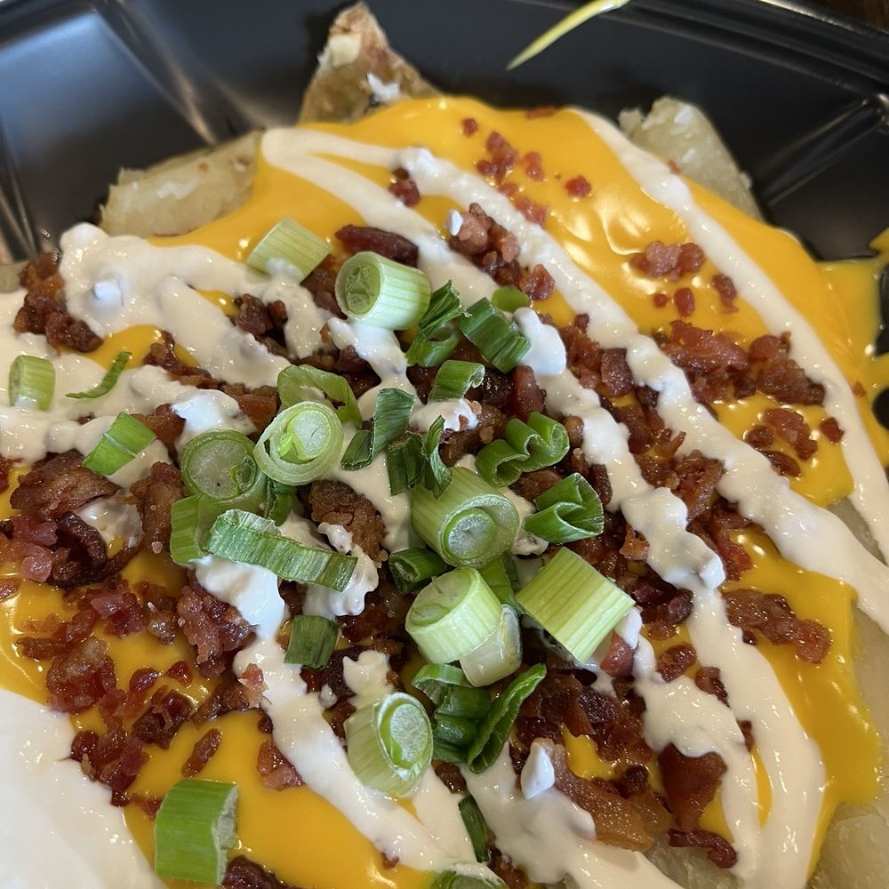 Meat & Potato Eatery-McHenry - loaded potato - Sandwiches Near Me - Mchenry, Illinois Meat & Potato Eatery-McHenry - loaded potato - Sandwiches Near Me - Mchenry, Illinois