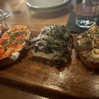Postino Addison - Goat cheese and pepper jam, mushroom, and french onion bruschetta - Wine Bars Near Me - Dallas, Texas Postino Addison - Goat cheese and pepper jam, mushroom, and french onion bruschetta - Wine Bars Near Me - Dallas, Texas