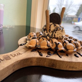 Just Tea - original egg puffs with cookies n cream ice cream topped with chocolate sticks, oreo and chocolate drizzle - Bubble Tea Near Me - Portland, Oregon Just Tea - original egg puffs with cookies n cream ice cream topped with chocolate sticks, oreo and chocolate drizzle - Bubble Tea Near Me - Portland, Oregon