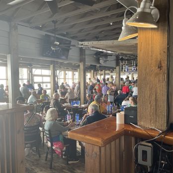 Schooners - Patio/bar are great place to people watch and enjoy the ocean. - Seafood Near Me - Panama City Beach, Florida Schooners - Patio/bar are great place to people watch and enjoy the ocean. - Seafood Near Me - Panama City Beach, Florida
