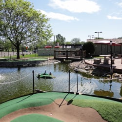 Epic Entertainment - One of the many relaxing views.  Sit and enjoy our Koi Fish, the sound of water while the kids enjoy golfing!