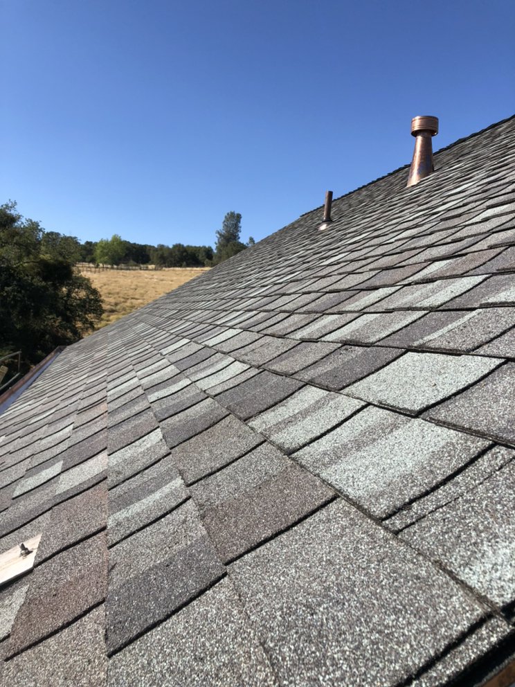 Slide of King Bee Roofing