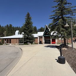 Exterior outside entrance of Evergreen Library - Jefferson County Public Library - Evergreen Library (currently getting a new roof). - Evergreen, Colorado Exterior outside entrance of Evergreen Library - Jefferson County Public Library - Evergreen Library (currently getting a new roof). - Evergreen, Colorado