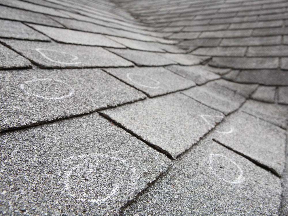 Slide of Action Roofing