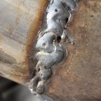 Muffler King & Transmissions - Very poor welds and obvious exhuast leak - Auto Repair Near Me - San Fernando, California Muffler King & Transmissions - Very poor welds and obvious exhuast leak - Auto Repair Near Me - San Fernando, California