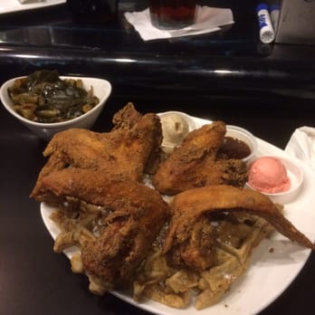 Dame's Chicken & Waffles - Dueling roosters: 4 bad mama jamma wings, strawberry creme shmear, maple pecan shmear on top of a sweet potato waffle. - Southern Near Me - Durham, North Carolina