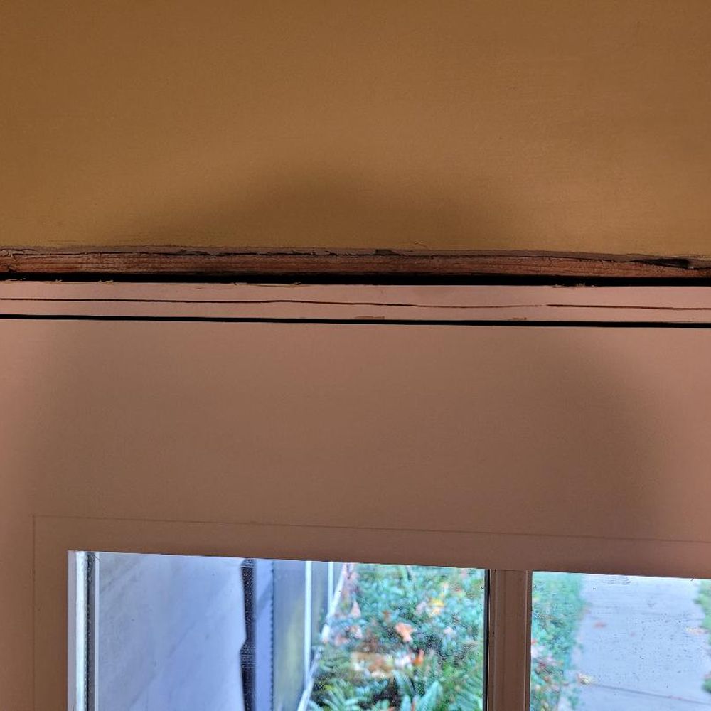 Fricks Home Services - Long, linear cut deep into wooden door jamb occurred when electric multi-tool used to trim overhanging sheetrock. Carpenter denied causing. - Handyman Near Me Fricks Home Services - Long, linear cut deep into wooden door jamb occurred when electric multi-tool used to trim overhanging sheetrock. Carpenter denied causing. - Handyman Near Me