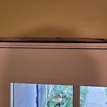 Fricks Home Services - Long, linear cut deep into wooden door jamb occurred when electric multi-tool used to trim overhanging sheetrock. Carpenter denied causing. - Handyman Near Me