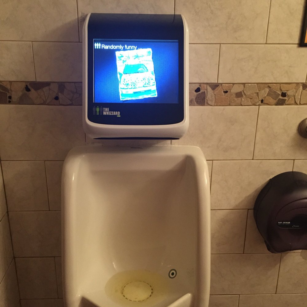 They have a TV screen on top of the urinal :)