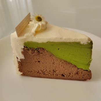 Motto Tea Cafe - MATCHA NAMA CHOCOLATE BASQUES CHEESECAKE - NOT A BASQUE CHEESECAKE! It has a gelatin texture. Vague flavor. NOT A CHEESECAKE! - Bubble Tea Near Me - San Gabriel, California Motto Tea Cafe - MATCHA NAMA CHOCOLATE BASQUES CHEESECAKE - NOT A BASQUE CHEESECAKE! It has a gelatin texture. Vague flavor. NOT A CHEESECAKE! - Bubble Tea Near Me - San Gabriel, California